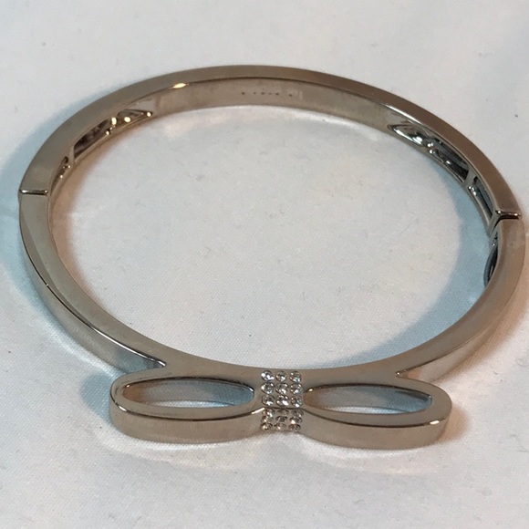 Lia Sophia Jewelry - Lia Sophia bow bracelet, rhinestones, silver tone, bangle with stretch b…